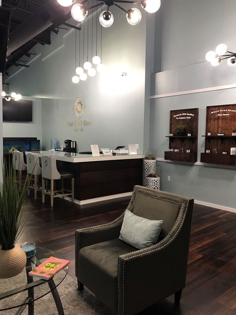 Premium home bar featuring inset cabinetry and integrated lighting