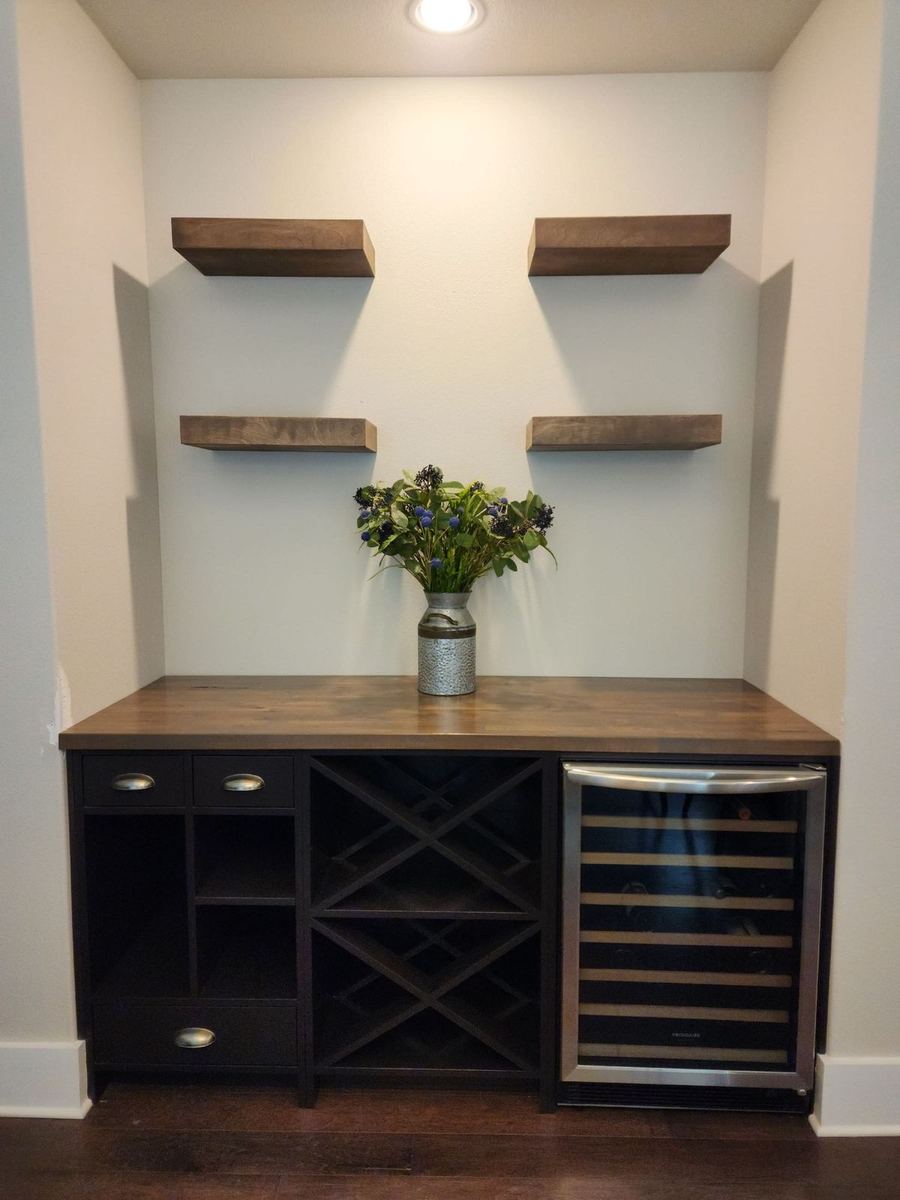 Bespoke butler's pantry with tailored shelving and base storage