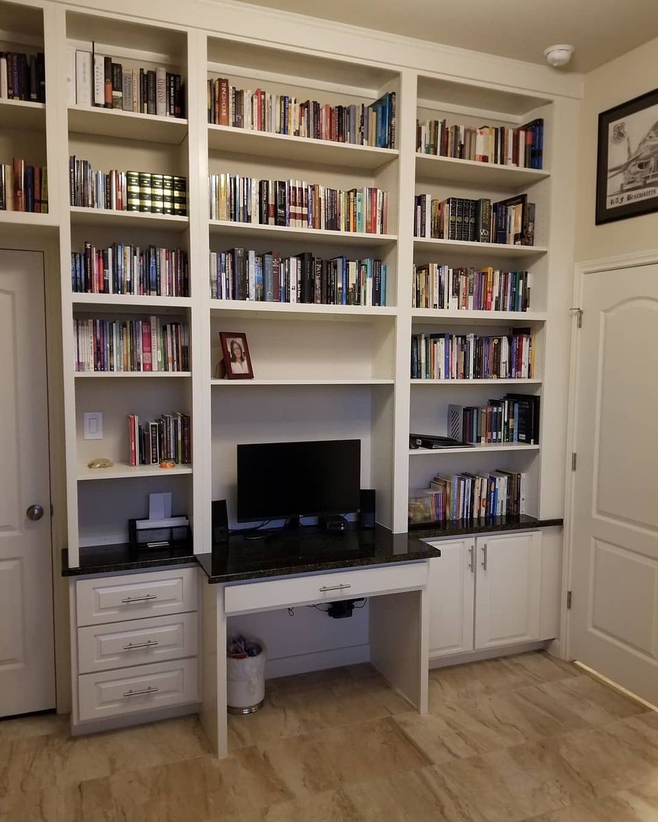 Tailored living room built-ins flanking a feature wall