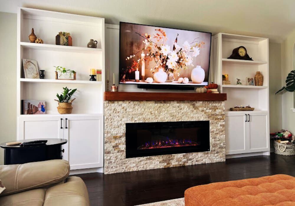 Custom media wall with integrated cabinetry and fireplace surround