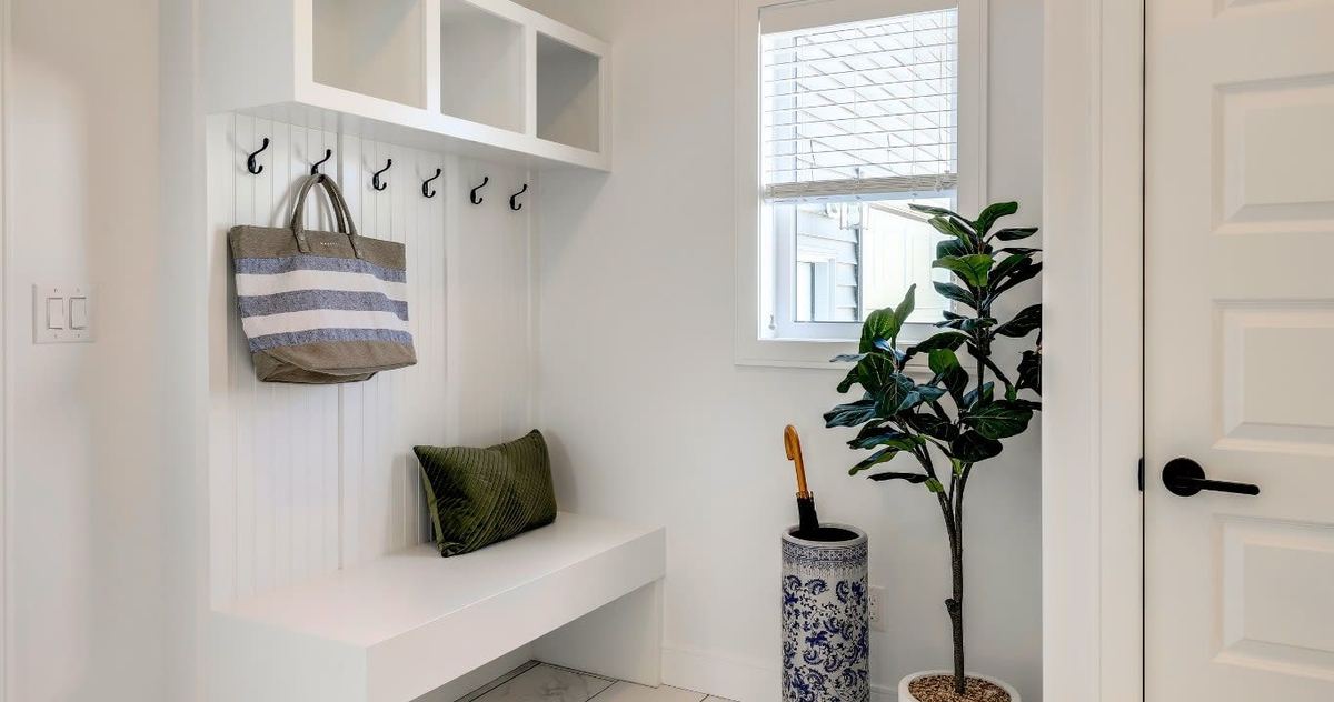 Luxury mudroom cabinetry with integrated bench seating
